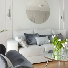 Najmodniejsze dodatki do białych ścian w salonie - pomysły na aranżacje